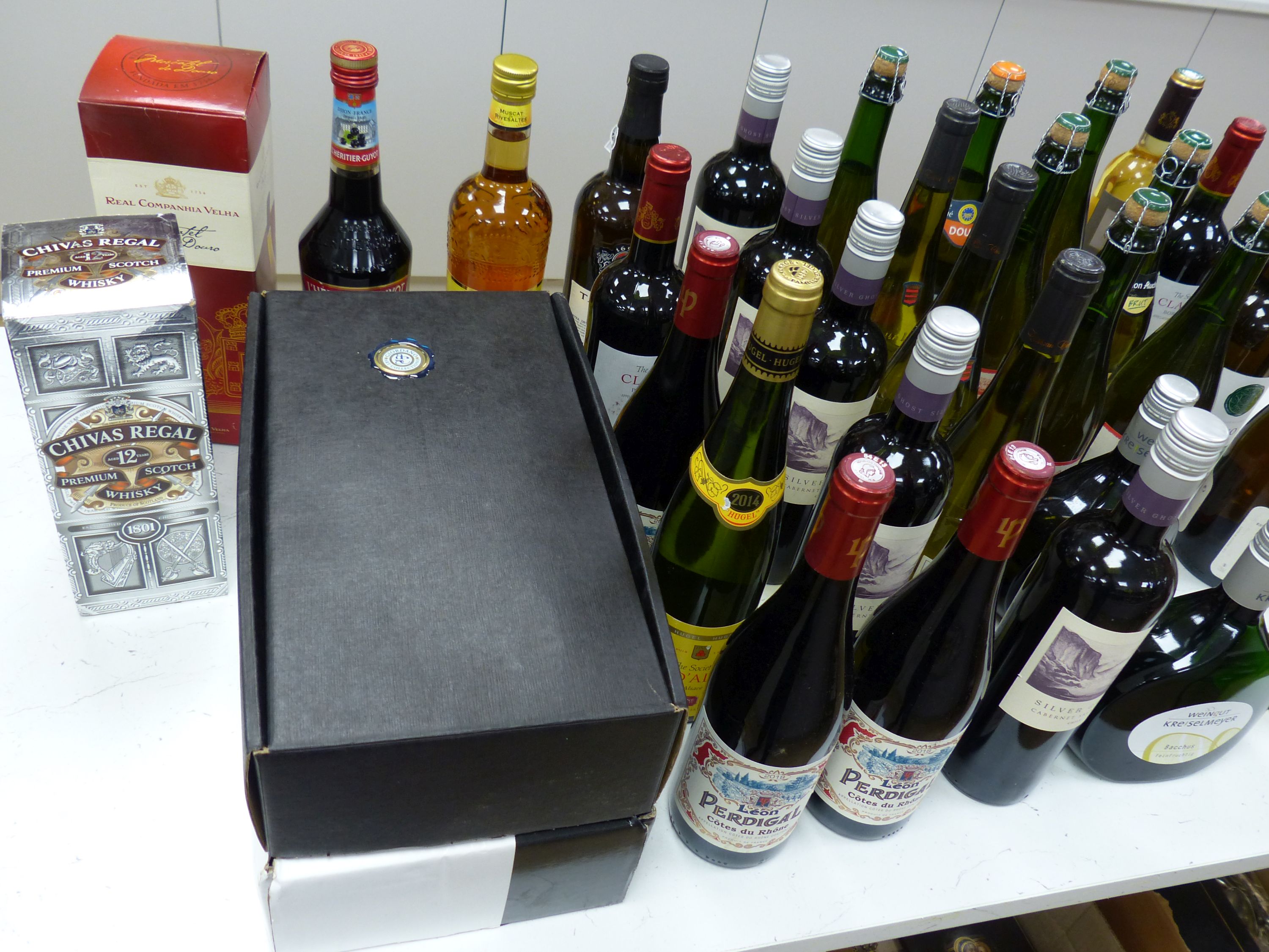 A large quantity of mixed wines, spirits and liqueurs including a 12 year Chivas Regal